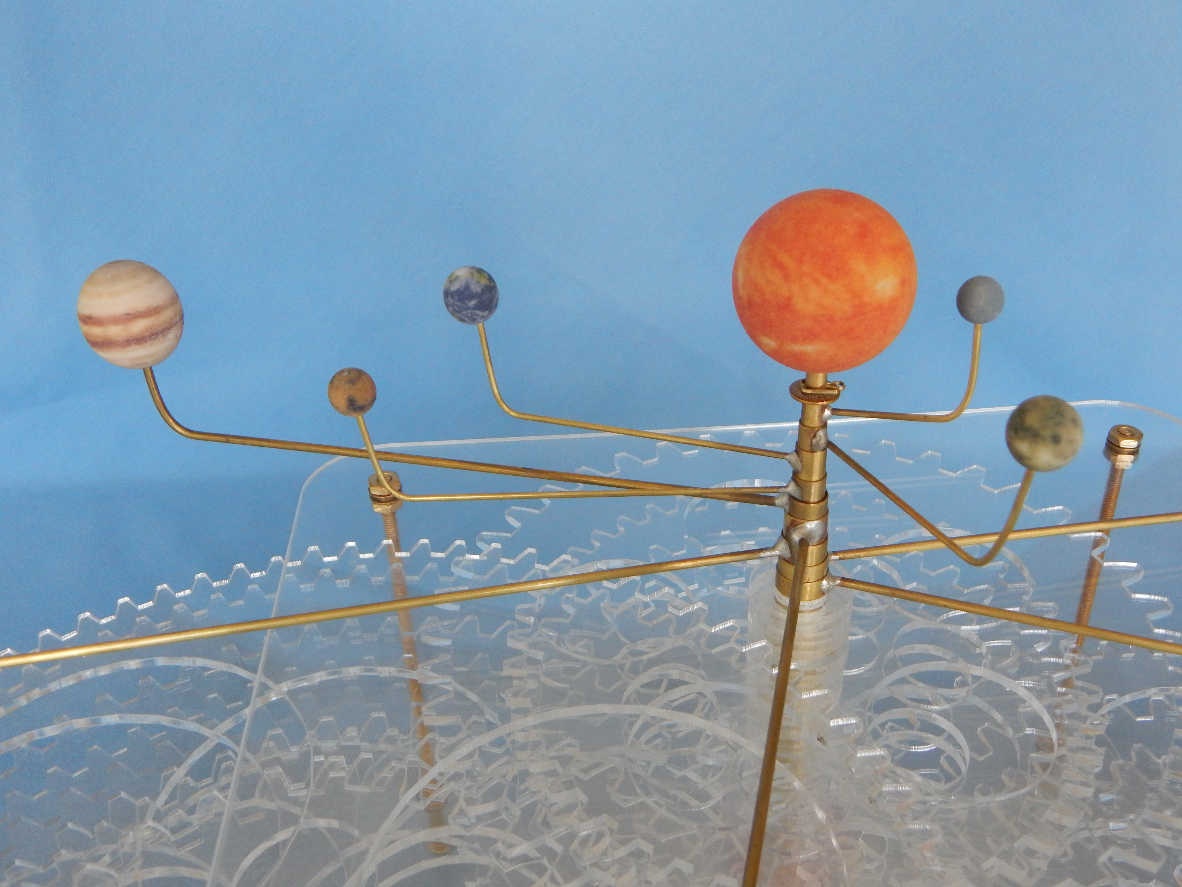 Closeup of orrery showing the appearance of the Sun, inner planets, and Jupiter.