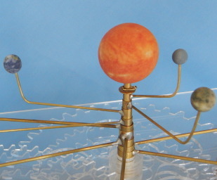 Thumbnail image of orrery, cropped to show the sun, Mercury, Venus, and Earth